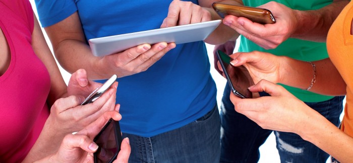 Group of people with smartphones. Technology.